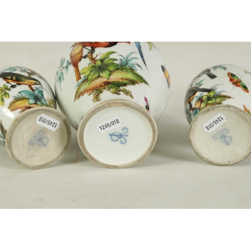 51 - A MATCHED GARNITURE OF THREE LATE 19TH CENTURY AUGUSTUS REX VASES with Meissen style decoration of e... 