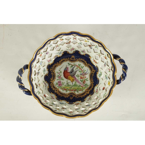 53 - A 19TH CENTURY FIRST PERIOD WORCESTER TYPE TWO-HANDLED LATTICEWORK BASKET decorated in blue and gilt... 