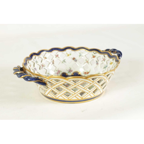 53 - A 19TH CENTURY FIRST PERIOD WORCESTER TYPE TWO-HANDLED LATTICEWORK BASKET decorated in blue and gilt... 