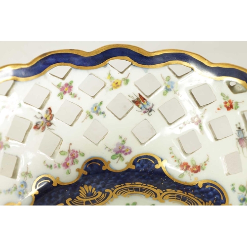 53 - A 19TH CENTURY FIRST PERIOD WORCESTER TYPE TWO-HANDLED LATTICEWORK BASKET decorated in blue and gilt... 