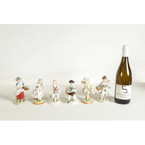 54 - A PAIR OF LATE 19TH CENTURY SITZENDORF PORCELAIN SEATED FIGURES depicting flower sellers dressed in ... 