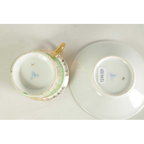 57 - A LATE 19TH CENTURY AUGUSTUS REX CABINET CUP AND SAUCER AND A SIMILAR CUP with floral panelled and f... 