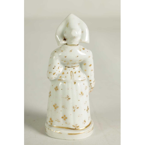 59 - A LATE 19TH CENTURY CONTINENTAL FIGURE OF A STANDING NUN formed as a scent bottle with detachable he... 