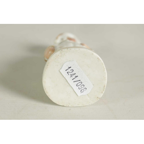 59 - A LATE 19TH CENTURY CONTINENTAL FIGURE OF A STANDING NUN formed as a scent bottle with detachable he... 