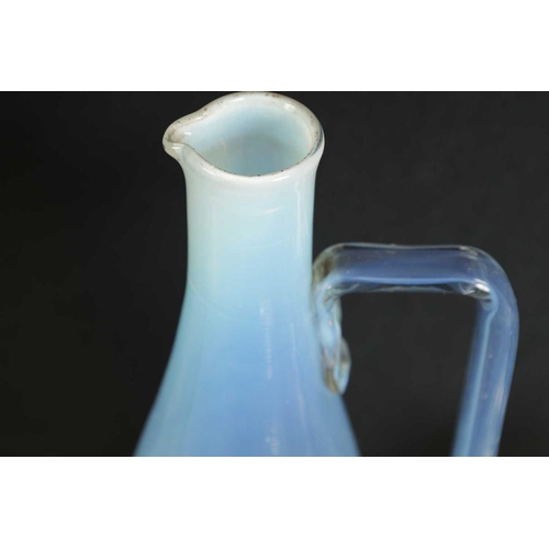 6 - A COLLECTION OF LATE 19TH CENTURY VASELINE GLASSWARE comprising a water jug and glasses etc (27.5cm ... 