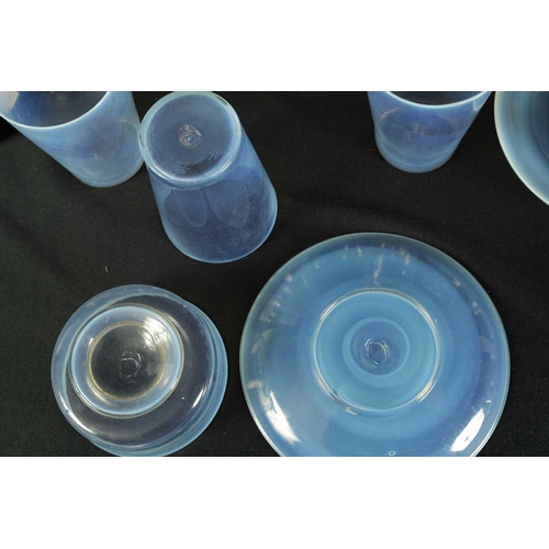 6 - A COLLECTION OF LATE 19TH CENTURY VASELINE GLASSWARE comprising a water jug and glasses etc (27.5cm ... 