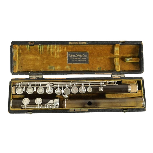 A RUDALL CARTE EBONITE FLUTE In velvet lined Moroccon leather case with
