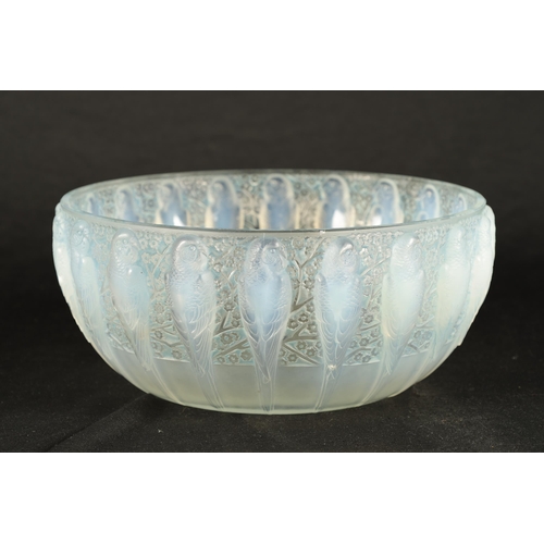 9 - A RENE LALIQUE OPALESCENT BLUE STAINED 'PERRUCHES' BOWL stencil mark 'R. LALIQUE, FRANCE'. (25cm dia... 