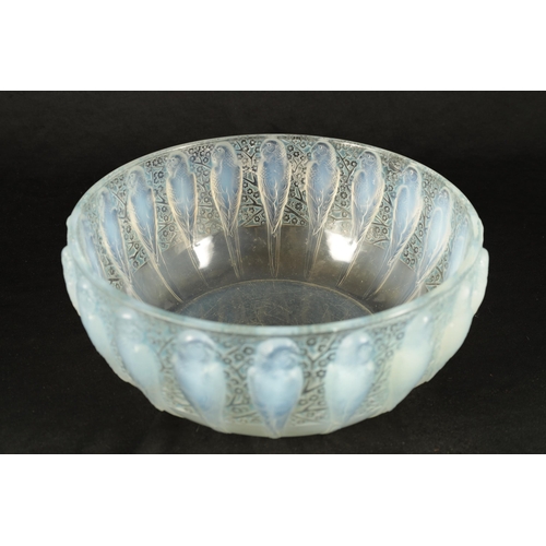 9 - A RENE LALIQUE OPALESCENT BLUE STAINED 'PERRUCHES' BOWL stencil mark 'R. LALIQUE, FRANCE'. (25cm dia... 