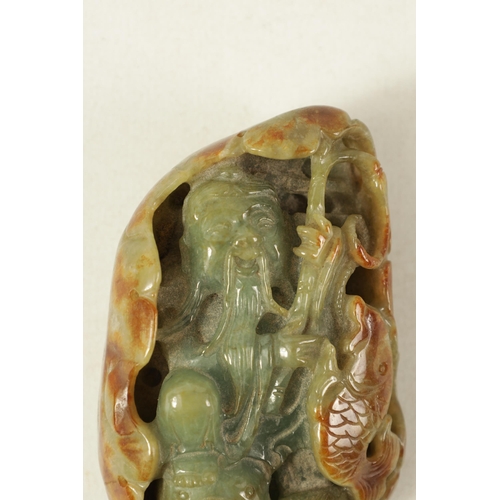 102 - A CHINESE RUSSET JADE CARVED AND PIERCED SCULPTURE modelled as a Sage with fish (9cm high )