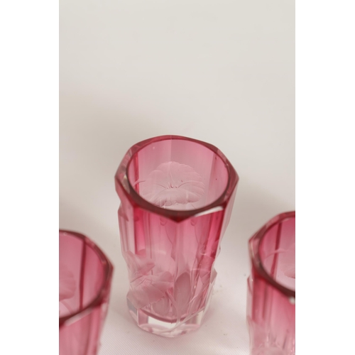 11 - AN ART NOUVEAU RUBY AND CLEAR GLASS MOSER DECANTER, TRAY AND SIX GLASSES deeply cut with intaglio de... 