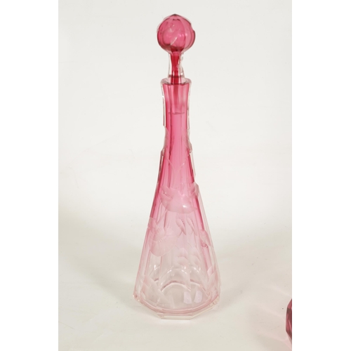 11 - AN ART NOUVEAU RUBY AND CLEAR GLASS MOSER DECANTER, TRAY AND SIX GLASSES deeply cut with intaglio de... 