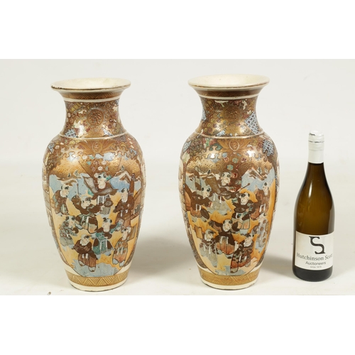 112 - A PAIR OF JAPANESE MEIJI PERIOD SATSUMA SHOULDERED TAPERING VASES richly gilt and decorated with cou... 