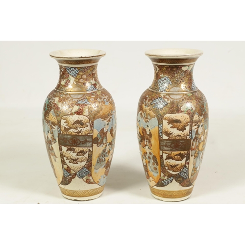 112 - A PAIR OF JAPANESE MEIJI PERIOD SATSUMA SHOULDERED TAPERING VASES richly gilt and decorated with cou... 