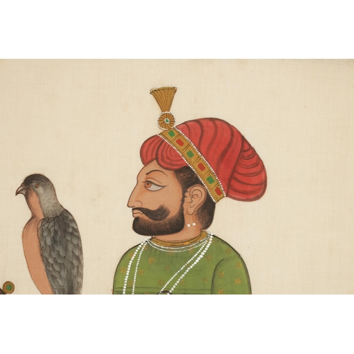 117 - A 19TH CENTURY INDIAN WARECOLOUR AND INK PAINTING ON SILK OF GURU GOBIND SINGH ON HORSE BACK holding... 