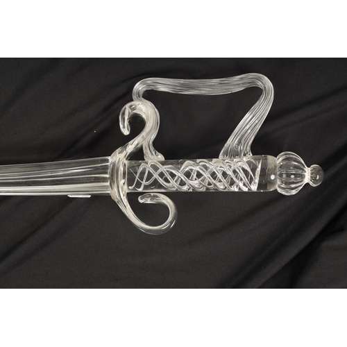 12 - A 1970’S IRISH CRYSTAL GLASS SWORD BY CAVAN OF COUNTY MONAHAN with air twist handle and scrolled hil... 