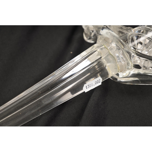 12 - A 1970’S IRISH CRYSTAL GLASS SWORD BY CAVAN OF COUNTY MONAHAN with air twist handle and scrolled hil... 