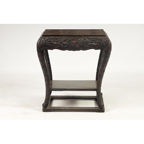 121 - A LATE 19TH CENTURY CHINESE RED GROUND AND BLACK LACQUERWORK CENTRE TABLE the plain top on a rounded... 