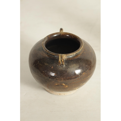 124 - A CHINESE TANG PERIOD BROWN SLIPWARE POT with loop handles and tapering foot (11cm high)