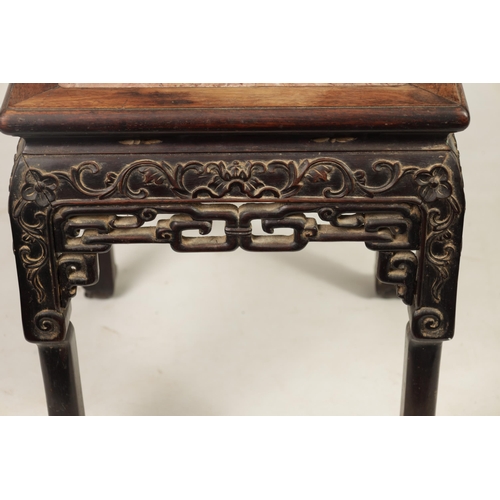 129 - A 19TH CENTURY CHINESE HARDWOOD JARDINIERE STAND with inset marble top above a carved pierced base w... 