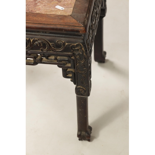 129 - A 19TH CENTURY CHINESE HARDWOOD JARDINIERE STAND with inset marble top above a carved pierced base w... 