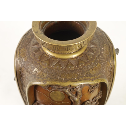 137 - A JAPANESE MEIJI PERIOD BRONZE AND GILT BRONZE RELIEF MOULDED VASE with four high relief panels depi... 