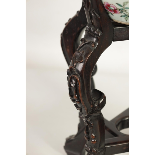 143 - A GOOD 19TH CENTURY CHINESE FAMILLE ROSE JARDINIERE ON CARVED HARDWOOD STAND the rounded body decora... 