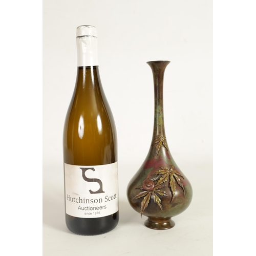 146 - A JAPANESE MEIJI PERIOD MULTI PATINA BRONZE SNAIL VASE the slender neck and applied leaf work decora... 