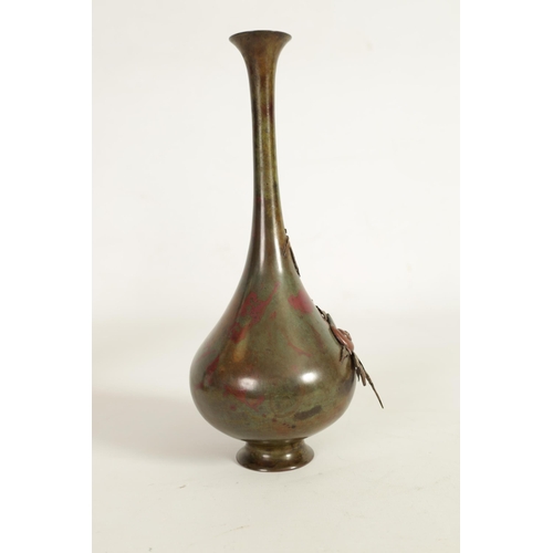 146 - A JAPANESE MEIJI PERIOD MULTI PATINA BRONZE SNAIL VASE the slender neck and applied leaf work decora... 