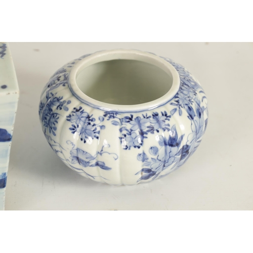 148 - A 19th CENTURY CHINESE BLUE AND WHITE SQUARE TAPERING JARDINIERE with all-round river landscape deco... 