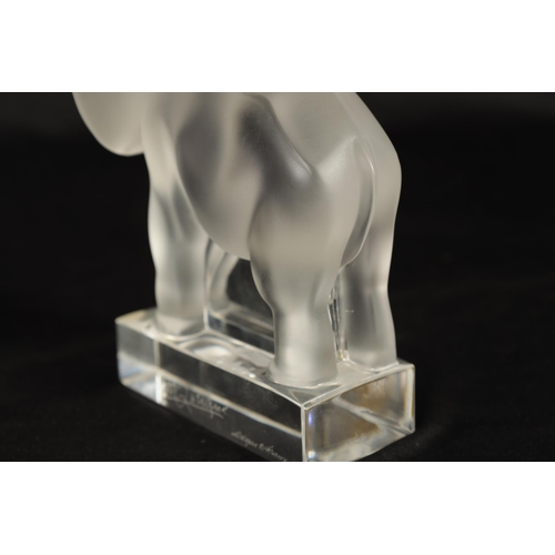 15 - A LALIQUE FROSTED GLASS ELEPHANT with raised trunk standing on a plinth base - with double signature... 