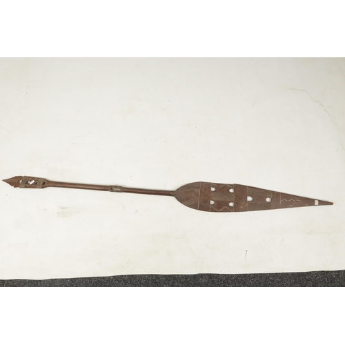 150 - A 19TH CENTURY AFRICAN HARDWOOD PADDLE with cross-hatched carved decoration (167cm overall)