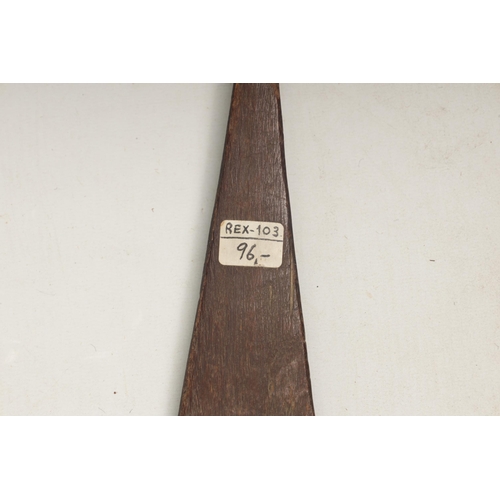 150 - A 19TH CENTURY AFRICAN HARDWOOD PADDLE with cross-hatched carved decoration (167cm overall)