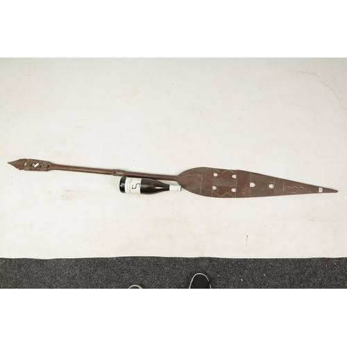 150 - A 19TH CENTURY AFRICAN HARDWOOD PADDLE with cross-hatched carved decoration (167cm overall)