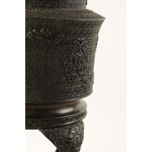 152 - A LARGE MEIJI PERIOD JAPANESE BRONZE KORO AND COVER surmounted by an Oni finial on a circular lid ab... 