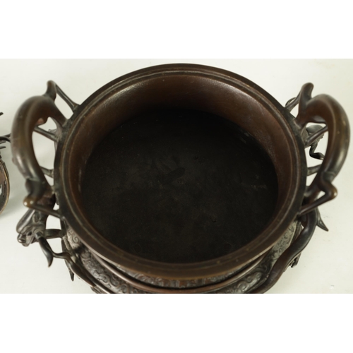 156 - A 19TH CENTURY CHINESE BRONZE CENSER AND LID MOUNTED ON A HARDWOOD STAND with pierced dragons head a... 