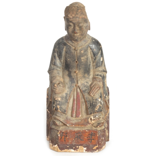 157 - A CHINESE MING PERIOD CARVED WOODEN FIGURE OF AN IMMORTAL with polychrome decoartion and Chinese scr... 