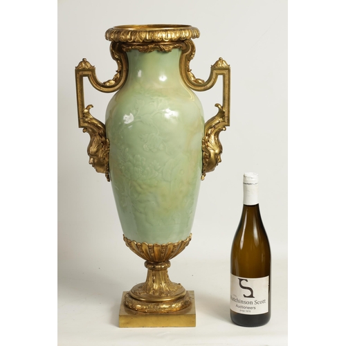 158 - AN IMPRESSIVE 19TH CENTURY CHINESE CELADON PORCELAIN TAPERING VASE WITH GILT BRONZE MOUNTS having fl... 