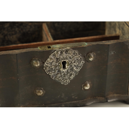 159 - AN 18TH CENTURY CEYLONESE CARVED EBONY AND SILVER METAL MOUNTED JEWELLERY BOX with leaf carved serpe... 