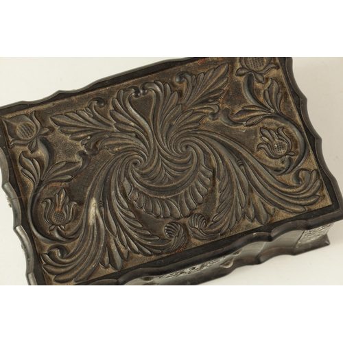 159 - AN 18TH CENTURY CEYLONESE CARVED EBONY AND SILVER METAL MOUNTED JEWELLERY BOX with leaf carved serpe... 