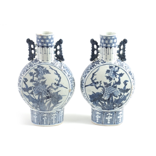 161 - A PAIR OF 19TH CENTURY CHINESE BLUE AND WHITE MOON FLASKS decorated with birds amongst flowering bra... 