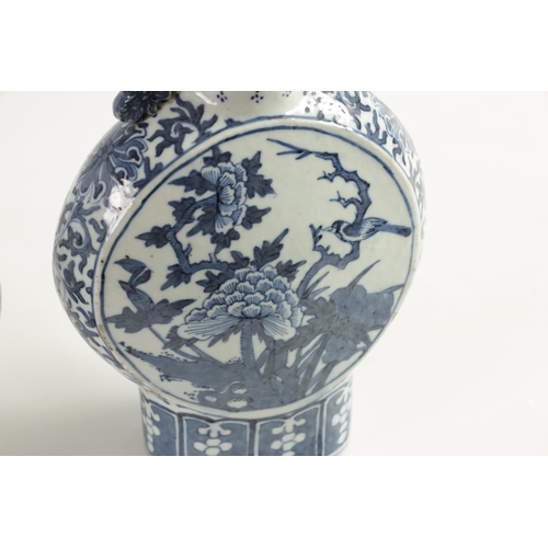 161 - A PAIR OF 19TH CENTURY CHINESE BLUE AND WHITE MOON FLASKS decorated with birds amongst flowering bra... 