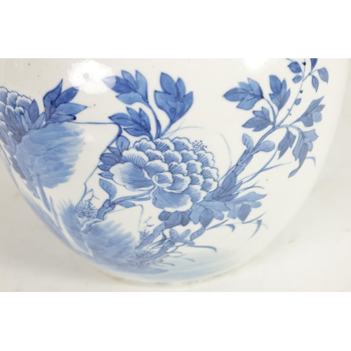 162 - AN 18TH CENTURY CHINESE BLUE AND WHITE GINGER JAR AND COVER decorated with flowering branchwork - si... 