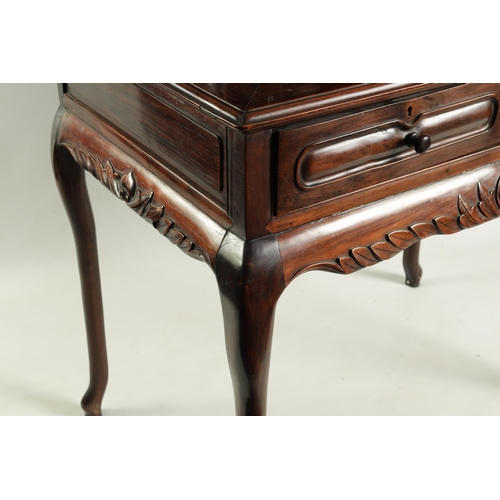 169 - A 19TH CENTURY CHINESE HARDWOOD WRITING TABLE the leaf-carved raised super-structure fitted with sma... 