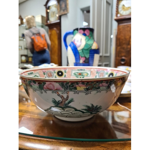 170 - A 19TH CENTURY CHINESE FAMILLE ROSE PORCELAIN BOWL decorated brightly coloured landscape scenes - si... 