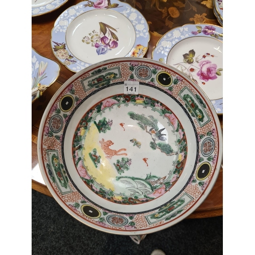 170 - A 19TH CENTURY CHINESE FAMILLE ROSE PORCELAIN BOWL decorated brightly coloured landscape scenes - si... 