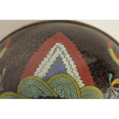 171 - A CHINESE CLOISONNE ENAMEL DRAGON BOWL decorated with five claw dragons amongst copper inlaid clouds... 
