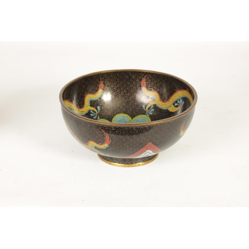 171 - A CHINESE CLOISONNE ENAMEL DRAGON BOWL decorated with five claw dragons amongst copper inlaid clouds... 