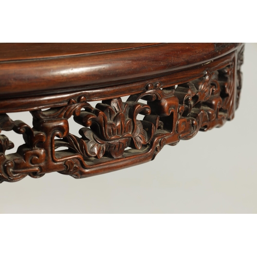 180 - A GOOD 19TH CENTURY CHINESE HARDWOOD CENTRE TABLE with inset marble top above a carved pierced work ... 