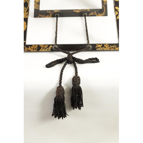 187 - A LATE EDO PERIOD JAPANESE LACQUERED FOLDING MIRROR STAND of easel form with scrolled top and decora... 